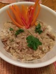 Risotto con prosciutto with sauteed onions and walnuts